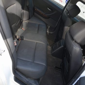 dirty car interior before detailing - rear seat